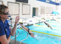 Swim coach helps Olympic champ go freestyling