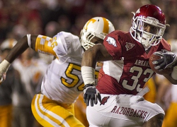 Arkansas routs Tennessee, 49-7