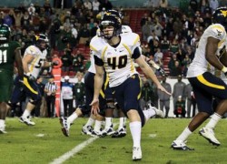 West Virginia stays alive for BCS berth with win over USF